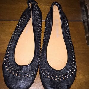 Black leather flats